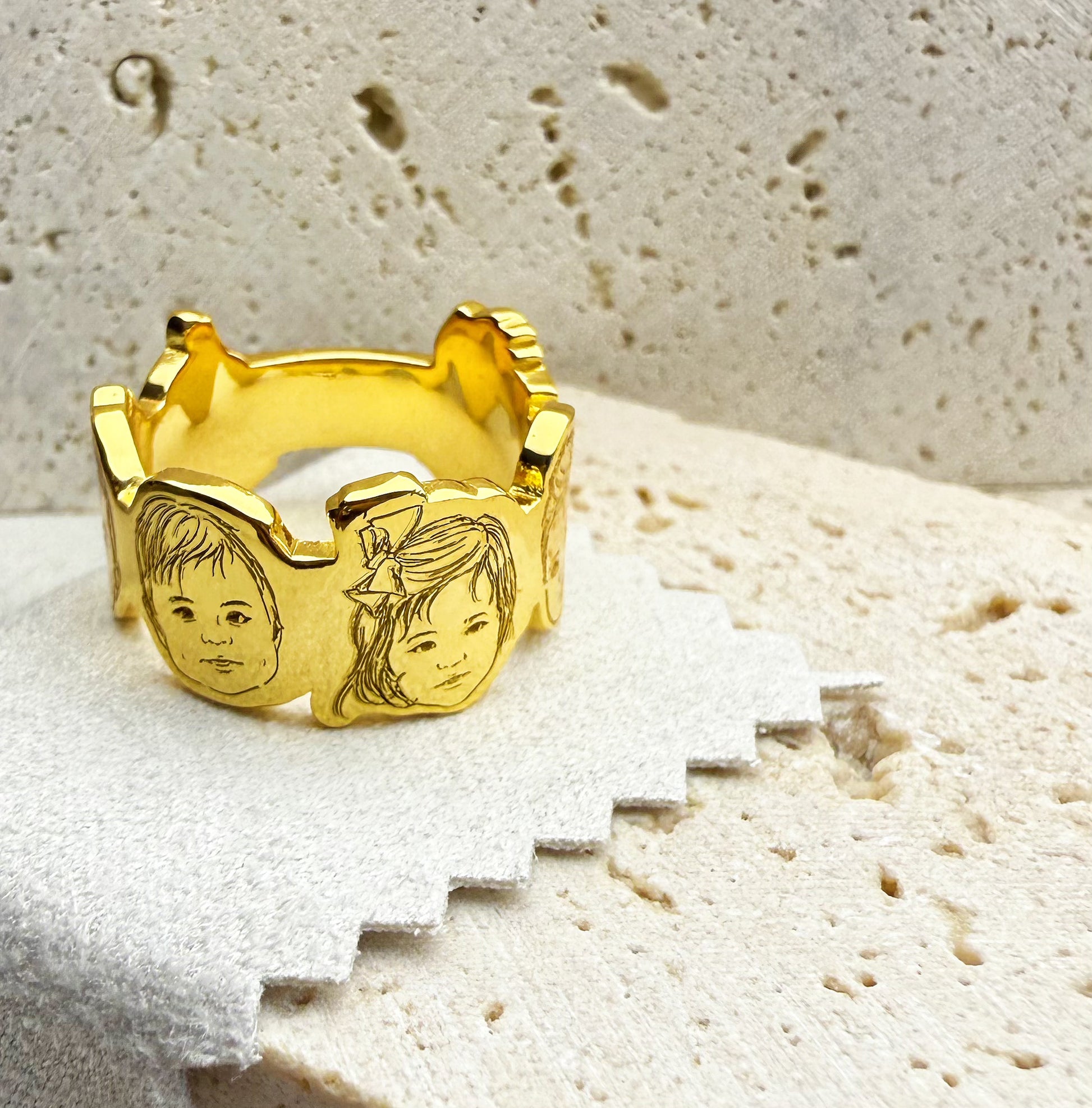 18K_Gold_Vermeil_customize_3D engraved baby photo portraits storyline ring on a textured stone surface
