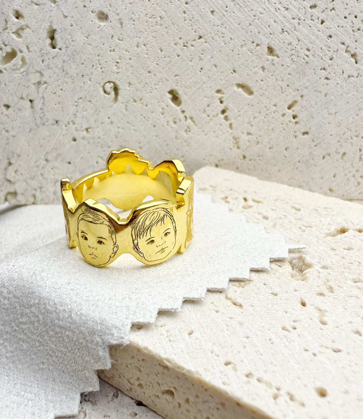 18K_Gold_Vermeil_customize_handcrafted baby photo portraits storyline ring on a textured stone surface