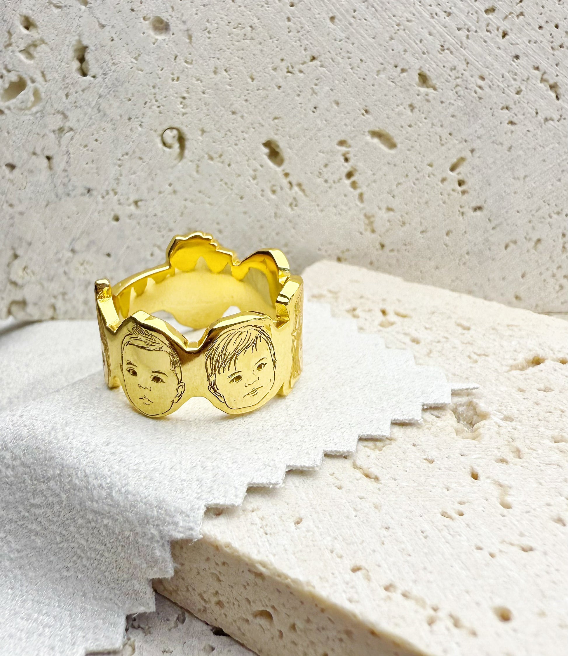 18K_Gold_Vermeil_customize_handcrafted baby photo portraits storyline ring on a textured stone surface
